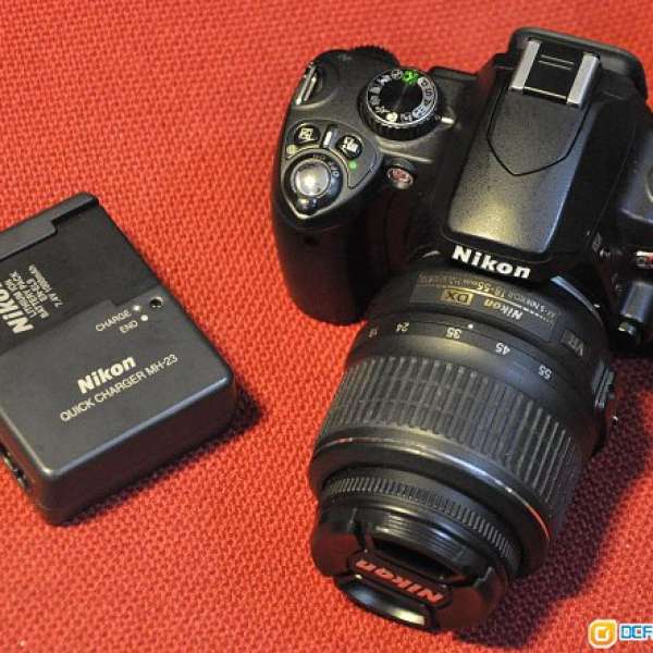 Nikon D60 + 18 55mm