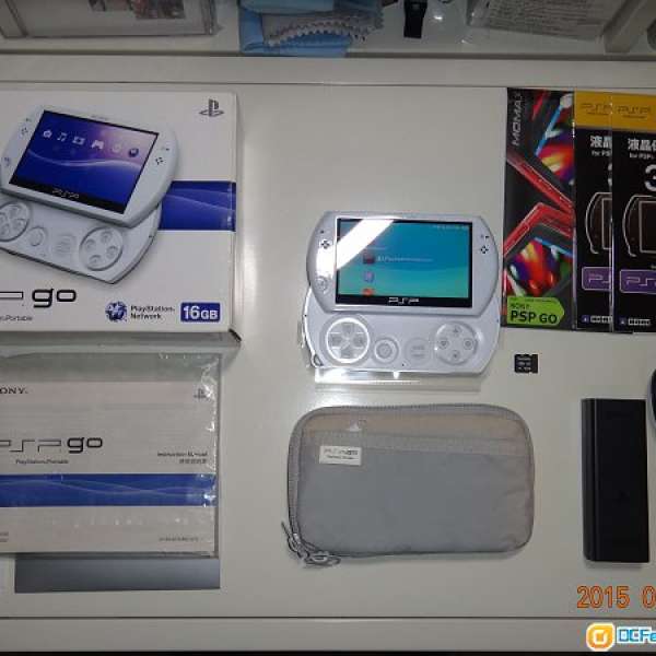 99%新 SONY PSP go白色 港行 有盒全套 內置16G 另跟SanDisk16G M2卡(內有7正版遊戲)...