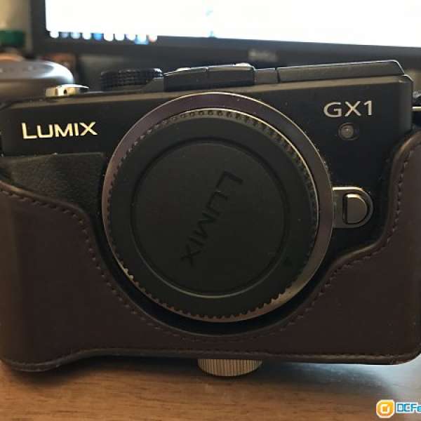 Panasonic Lumix DMC-GX1 +  14-42mm X
