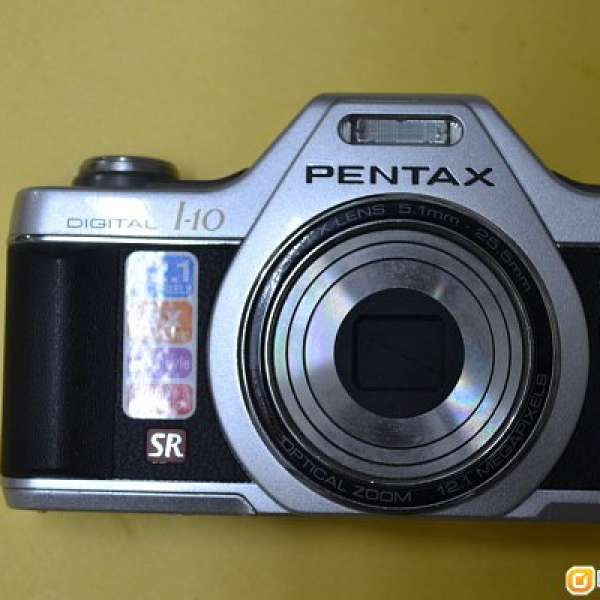 Pentax Optio I-10   紀念Pentax 在1979 年推出的Auto 110 單反 送古董紅字鏽花相機帶