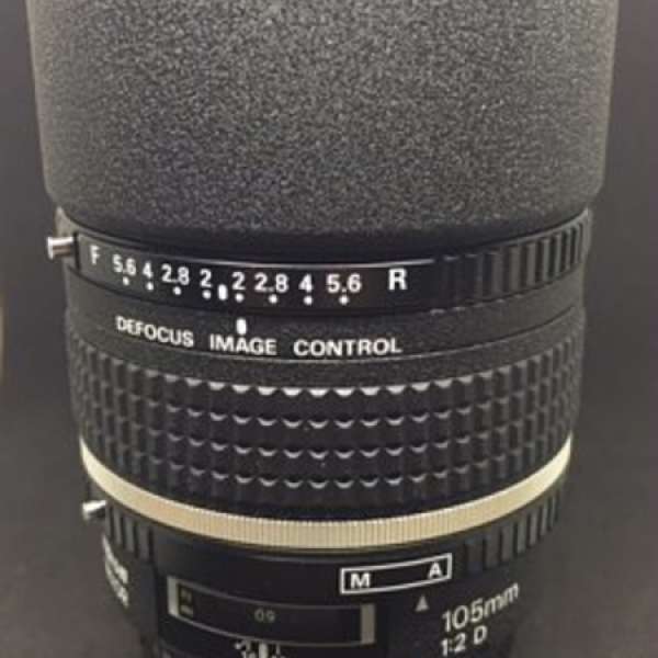 Nikon AF DC105mm F/2D with full packing