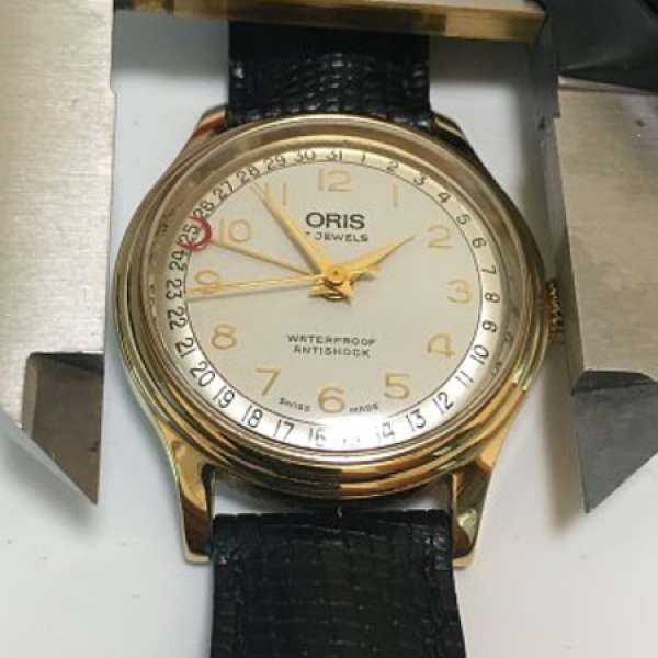 ORIS 鍍金手動上練四針日歷手表