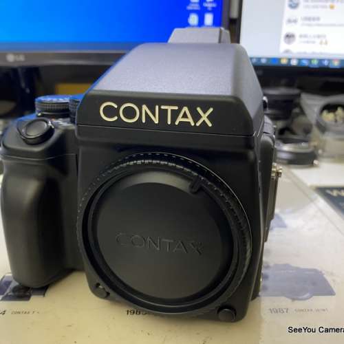 Over 95% New Contax 645 AF Body with Finder & Film Back set $13800. Only