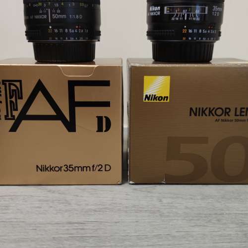 Nikon AF 35mm f2D ($750) & Nikon AF 50mm f1.8D ($350)