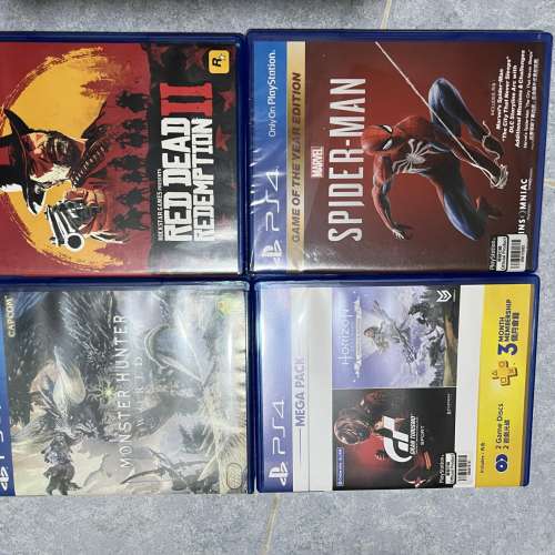 PS4 1TB SLIM WITH 2 JOYSTICKS AND 4 GAMES