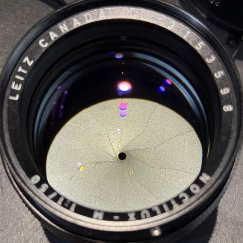 Leica Noctilux-M 50mm f1.0 v2 lens with original hood, filter and leather case