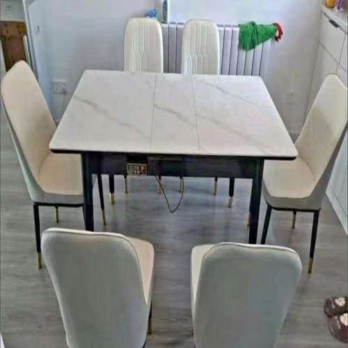 Freely retractable slate dining table