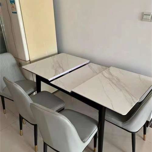 Freely retractable slate dining table