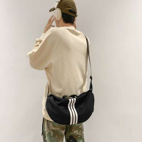 餃子包女2024新款休閒情侶斜挎包