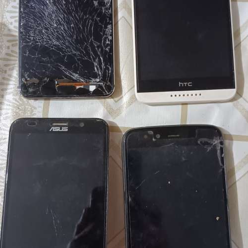 4部壞的智能手機。[零件機]