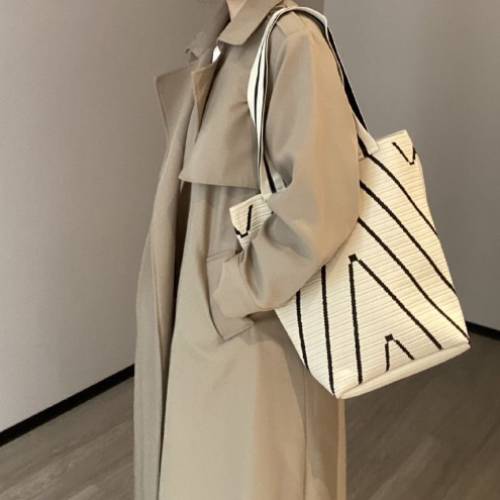 包包小眾設計波浪紋針織單肩包出街購物大容量包包通勤水桶包