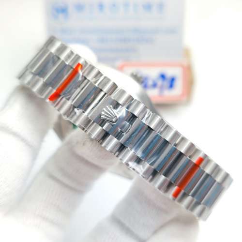 DayDate 228349 40mm Green Dial Roman Markers Fluted Bezel watch