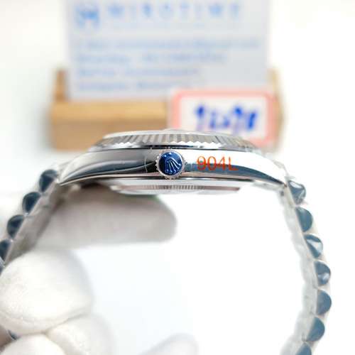 DayDate 228349 40mm Green Dial Roman Markers Fluted Bezel watch