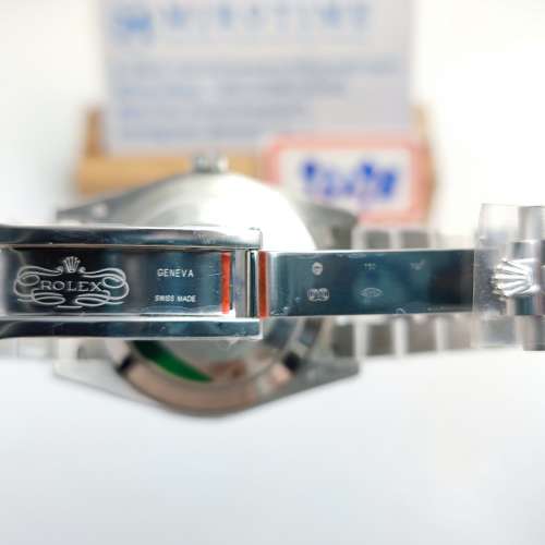 DayDate 228349 40mm Green Dial Roman Markers Fluted Bezel watch