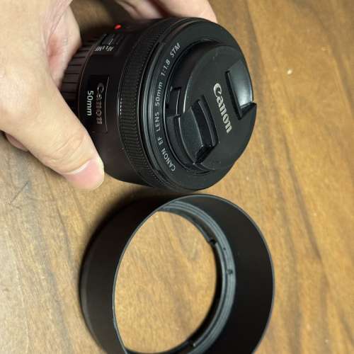 90% new used Canon EF f/1.8 STM lens with Canon stock ES-68 hood