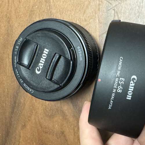 90% new used Canon EF f/1.8 STM lens with Canon stock ES-68 hood