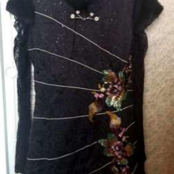 中式旗袍出讓有毛领的係厚款