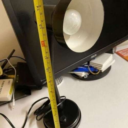 The desk lamp has an adjustable angle.