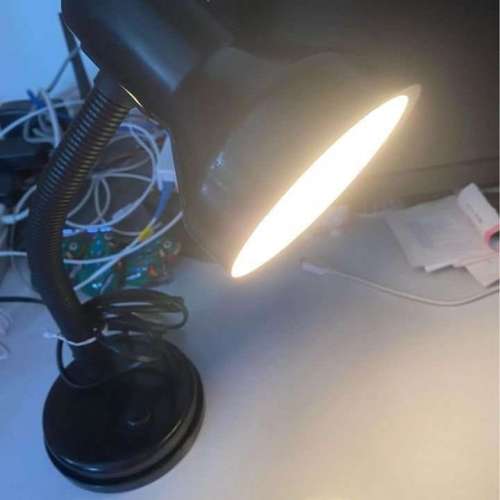 The desk lamp has an adjustable angle.