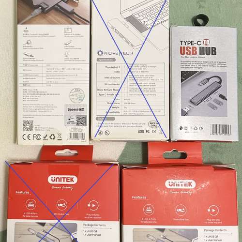 一堆全新轉換器和一個用過 Orico USB3.0 to SATA Adaptor