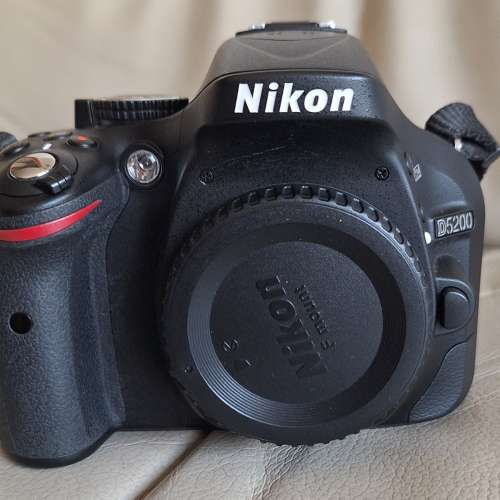 Nikon D5200 Body + 3 Nikkor Lens, 18-70mm, 55-200mm, 70-300mm.