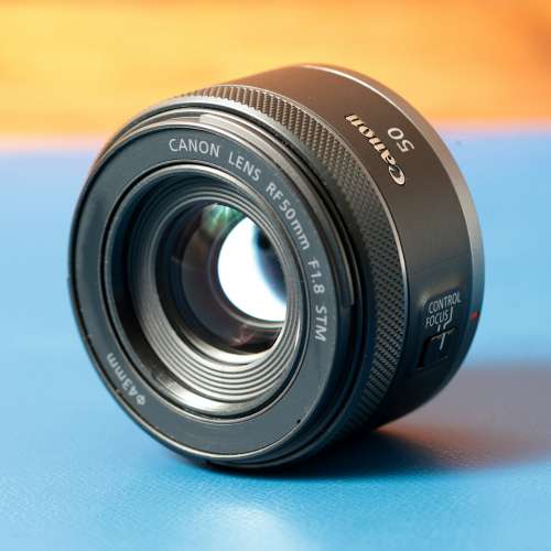 Canon RF 50mm f1.8 STM lens with JJC hood