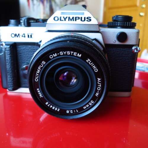 , Olympus OM 35mm F2.8 later multicoated version, $750