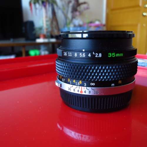 , Olympus OM 35mm F2.8 later multicoated version, $750