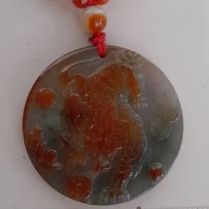 紅翠A玉下山虎吊墜48x6mm.連26寸紅翡頸鏈，下山虎氣勢兇猛鎮邪靈，護佑家中吉祥。n...