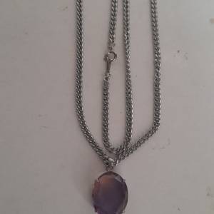 紫黃晶蛋形吊墜，20x16x6mm.切割面純銀托，配廿四寸不銹鋼頸鏈。no.19.3.25
