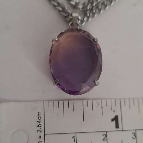 紫黃晶蛋形吊墜，20x16x6mm.切割面純銀托，配廿四寸不銹鋼頸鏈。no.19.3.25