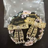 Embellished ribbon gold tone earrings