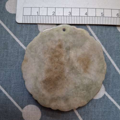 不知是甚麼玉的玉牌