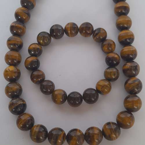 一套天然虎眼石14mm16寸頸鏈配上焊口波仔扣總長度約十八寸，加上一條十三mm珠手串，...