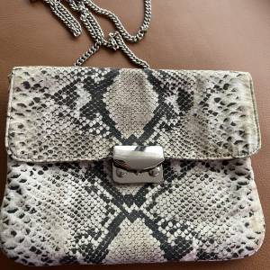 AUS Witchery crossbody clutch bag