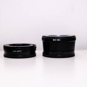 M42 to Sony e-mount adapter + m-mount to Sony e-mount adapter, 共2個，$130 不...