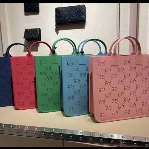 賣全新GUCCI 橡膠手提袋粉紅色