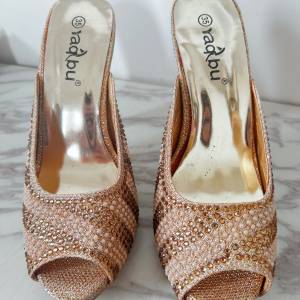Embellished peep toe high heels