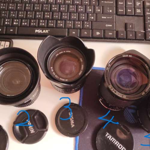 放四支副廠及一支原廠NIKON AF及手動對焦變焦鏡由 24-210mm共=2500