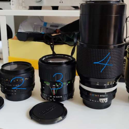 放三支副廠騰龍或威達及一支Nikon自動對焦鏡(再送一支手動對焦白咀NIKON 原廠135mm...