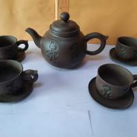 紫沙茶壺 共10.件  (壼底有小花   見圖)