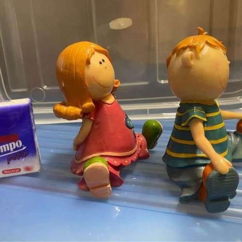(全新) 愛笑男孩女孩瓷公仔一對
