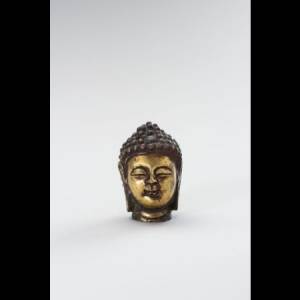 鎏金銅佛像A MINIATURE GILT-BRONZE BUDDHA HEAD with antique certificate