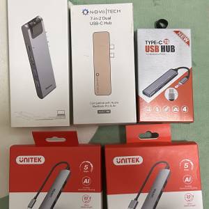 一堆全新轉換器和一個用過 Orico USB3.0 to SATA Adaptor