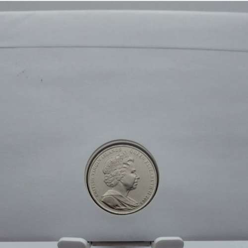 QEII COMMEMORATIVE COIN WITH STAMP FIRST DAY