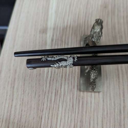 Shanghai tang dragon chopsticks and stand (brass and wood)
