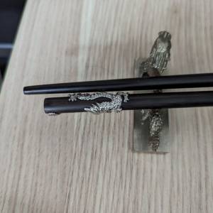 Shanghai tang dragon chopsticks and stand (brass and wood)