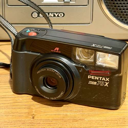 出售Pentax菲林相機1部，型號zoom70x，100%正常，閃光燈正常，日後功能正常，但只...