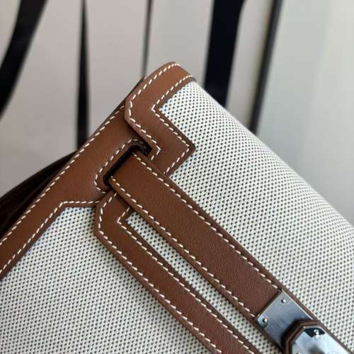 愛馬仕# Herm&egrave;s Kelly Depeches 25 帆布拼 Bar&eacute;nia 皮手拿 / 斜挎包 款號H051569...