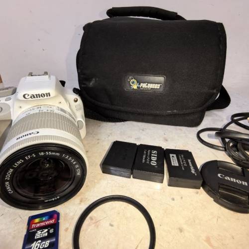 98新  佳能EOS 100D，
18-55mm镜头 配件送原装电池3块、SD卡16G、镜头盖、UV镜、充...